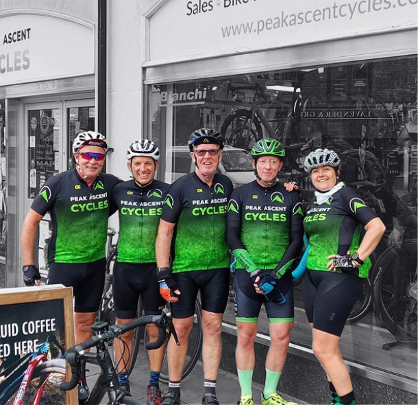 Peak Ascent Cycles Team Outside Store